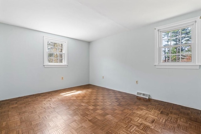 spare room with visible vents
