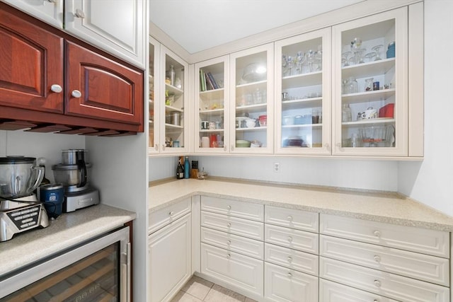 storage area featuring wine cooler