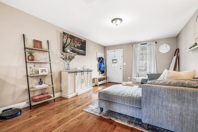 40 Winchester Ln Unit 10, Fall River, MA 02721 - living room featuring wood finished floors and baseboards