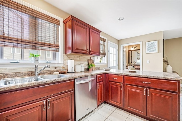 40 Winchester Ln Unit 10, Fall River, MA 02721 - kitchen featuring stainless steel dishwasher, a sink, a peninsula, reddish brown cabinets, and recessed lighting