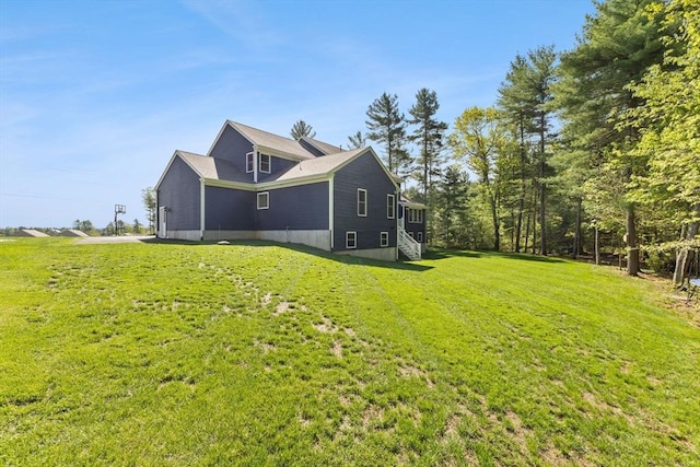 view of property exterior featuring a yard