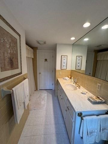18 Lily Pond Dr, Yarmouth, MA 02664 - full bathroom with vanity, recessed lighting, and tasteful backsplash