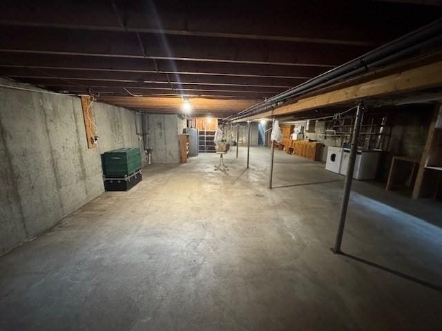 18 Lily Pond Dr, Yarmouth, MA 02664 - unfinished basement featuring washer / dryer