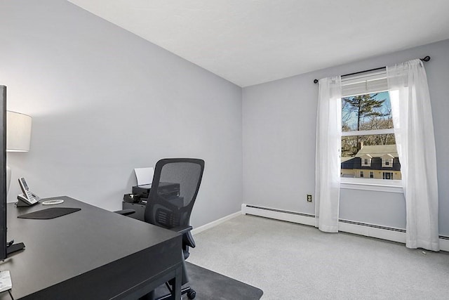 home office with baseboards and carpet flooring