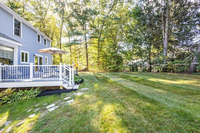 view of yard with a deck