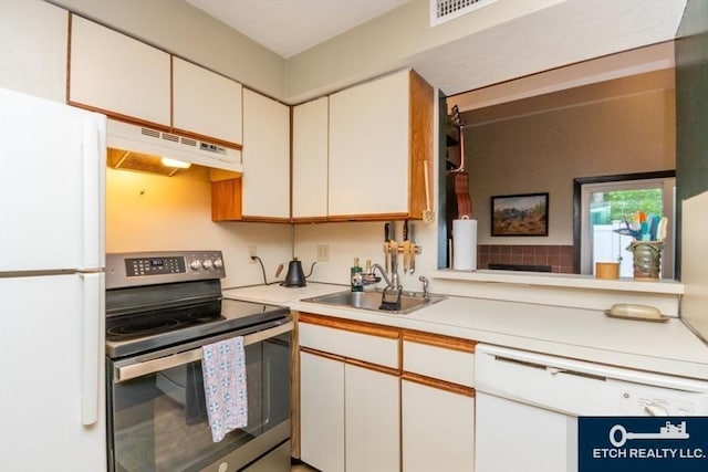 199 Lake St Unit 26, Weymouth, MA 02189 - kitchen featuring white appliances, under cabinet range hood, and light countertops