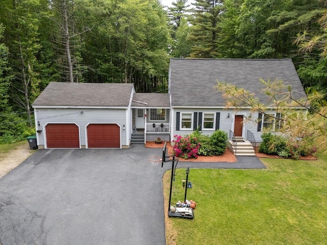 224 Church, Pembroke, NH 03275 - cape cod-style house featuring an attached garage, asphalt driveway, a front yard, and roof with shingles