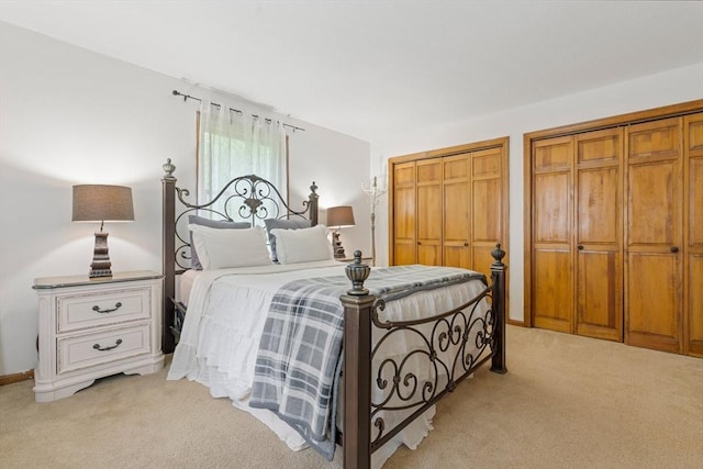 224 Church, Pembroke, NH 03275 - bedroom featuring light carpet and multiple closets