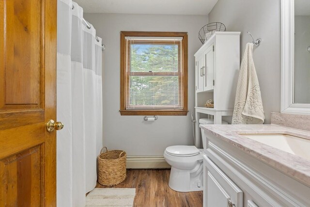 224 Church, Pembroke, NH 03275 - full bathroom featuring a baseboard radiator, vanity, and wood finished floors