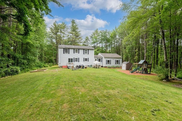 224 Church, Pembroke, NH 03275 - rear view of property featuring a storage shed and a lawn