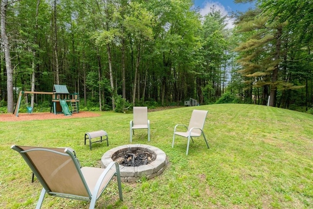 224 Church, Pembroke, NH 03275 - view of grassy yard featuring a fire pit and a playground