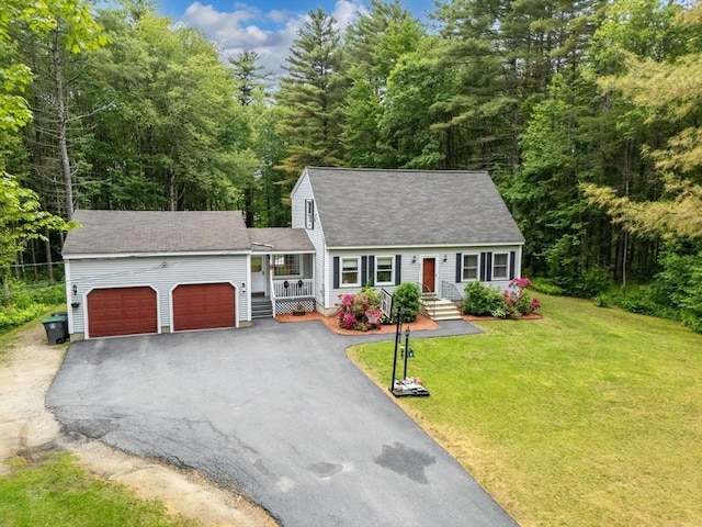 224 Church, Pembroke, NH 03275 - cape cod-style house with an attached garage, driveway, a front yard, a porch, and a view of trees