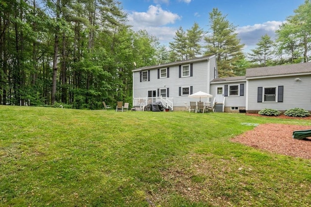 224 Church, Pembroke, NH 03275 - rear view of property with entry steps and a lawn
