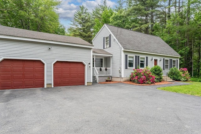 224 Church, Pembroke, NH 03275 - view of front facade featuring asphalt driveway, a garage, and a shingled roof