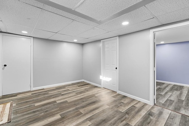 basement featuring hardwood / wood-style floors