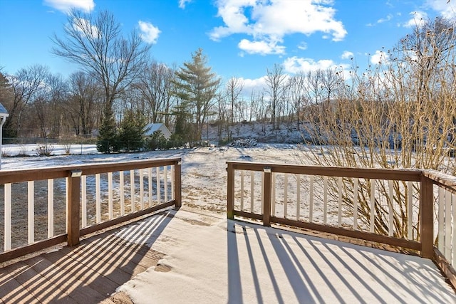 view of snow covered deck