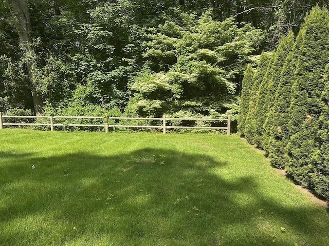 96 Wild Grove Ln, Longmeadow, MA 01106 - view of yard with a wooded view