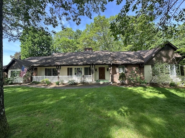 96 Wild Grove Ln, Longmeadow, MA 01106 - ranch-style house with a porch, a front lawn, and a chimney