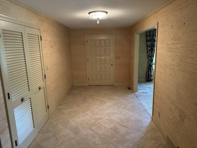 96 Wild Grove Ln, Longmeadow, MA 01106 - corridor featuring ornamental molding, a textured ceiling, and baseboards