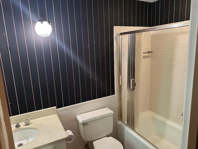 96 Wild Grove Ln, Longmeadow, MA 01106 - full bath with toilet, tile walls, shower / bath combination with glass door, and vanity