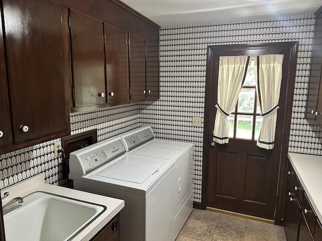 96 Wild Grove Ln, Longmeadow, MA 01106 - laundry room with washer and clothes dryer, cabinet space, and wallpapered walls