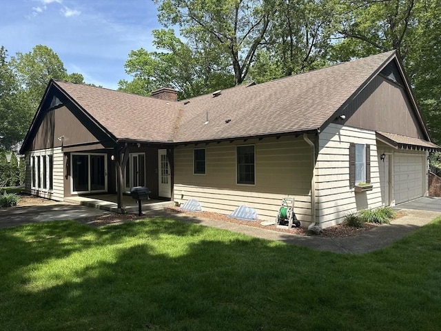 96 Wild Grove Ln, Longmeadow, MA 01106 - rear view of house featuring roof with shingles, a garage, a yard, and a chimney