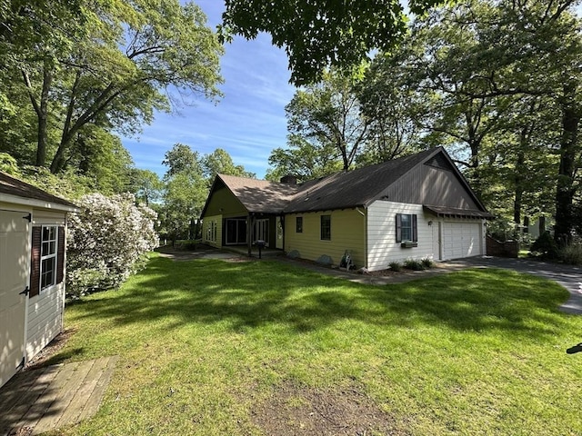 96 Wild Grove Ln, Longmeadow, MA 01106 - view of grassy yard featuring driveway