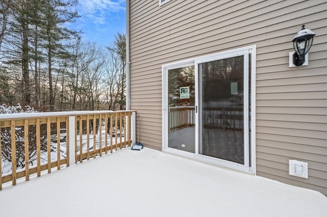 view of snow covered deck