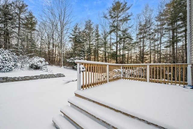 view of snow covered deck