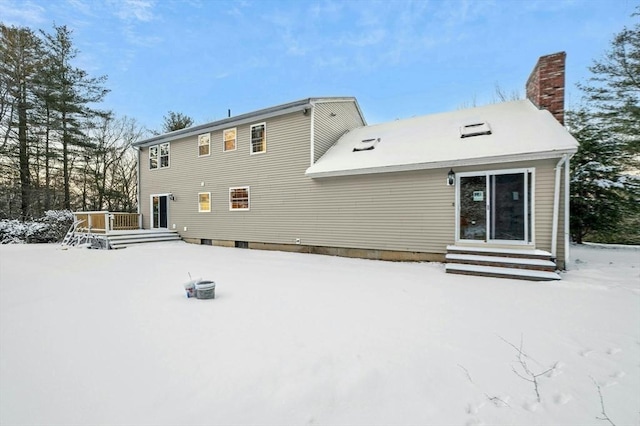 view of snow covered property