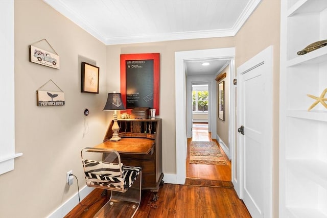 corridor with ornamental molding and dark hardwood / wood-style floors