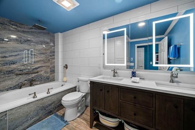 150 Lynnway Unit 406, Lynn, MA 01902 - full bathroom with double vanity, a combined bath / shower with rainfall shower, and wood finished floors