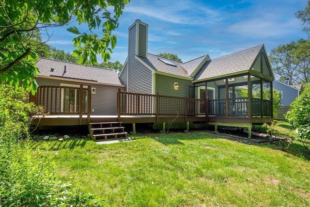 17 Indian Dawn Unit 17, Wayland, MA 01778 - back of house with a wooden deck, a lawn, a chimney, and a shingled roof
