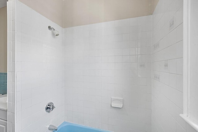bathroom featuring washtub / shower combination