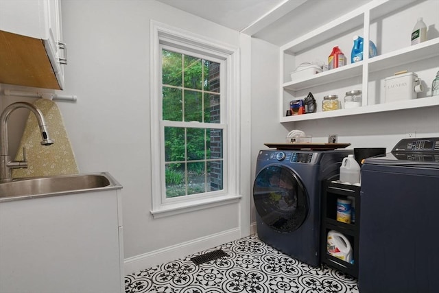 4 Rockwood Ln, Londonderry, NH 03053 - washroom featuring separate washer and dryer, cabinet space, and baseboards