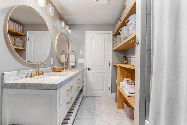 4 Rockwood Ln, Londonderry, NH 03053 - bathroom featuring marble finish floors and double vanity
