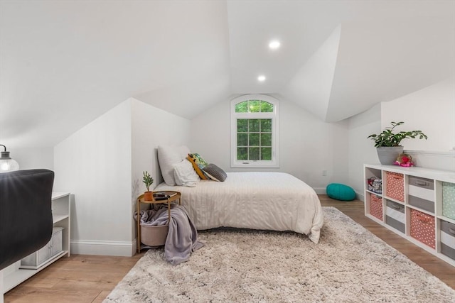4 Rockwood Ln, Londonderry, NH 03053 - bedroom featuring light wood-type flooring, lofted ceiling, and baseboards