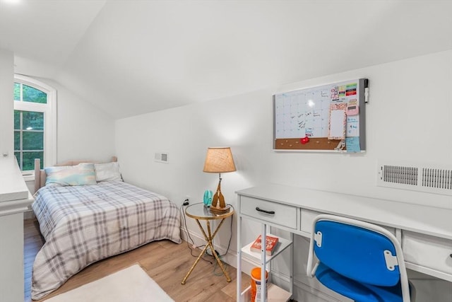 4 Rockwood Ln, Londonderry, NH 03053 - bedroom with light wood-type flooring and vaulted ceiling