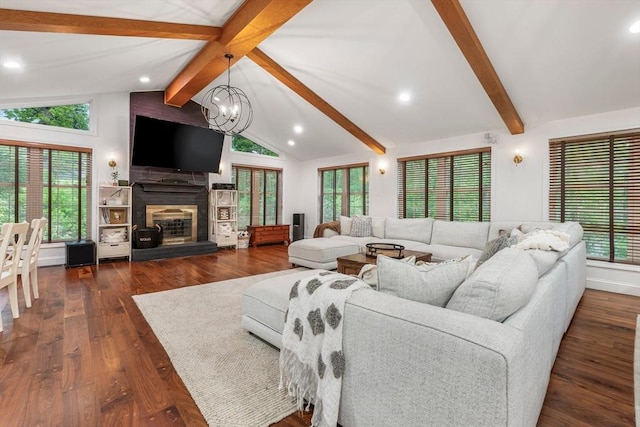 4 Rockwood Ln, Londonderry, NH 03053 - living area featuring a chandelier, dark wood-style floors, recessed lighting, and a glass covered fireplace