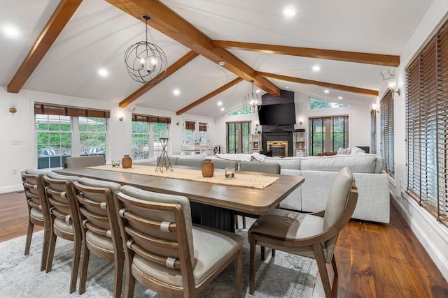 4 Rockwood Ln, Londonderry, NH 03053 - dining area featuring wood finished floors, recessed lighting, a glass covered fireplace, a chandelier, and baseboards