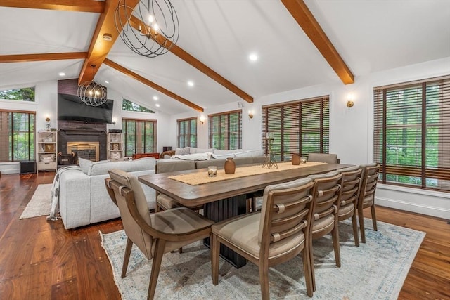 4 Rockwood Ln, Londonderry, NH 03053 - dining space with a chandelier, wood finished floors, a glass covered fireplace, and recessed lighting