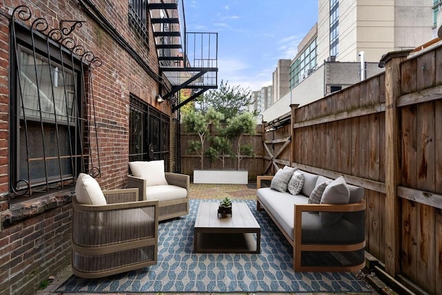 69 Saint Botolph Unit 1, Boston, MA 02116 - view of patio with outdoor lounge area