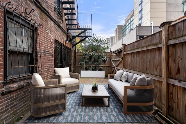 69 Saint Botolph Unit 1, Boston, MA 02116 - view of patio with outdoor lounge area