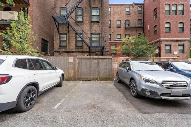 69 Saint Botolph Unit 1, Boston, MA 02116 - view of front of home featuring brick siding and uncovered parking