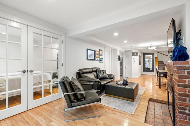 69 Saint Botolph Unit 1, Boston, MA 02116 - living room with hardwood / wood-style flooring, recessed lighting, and french doors
