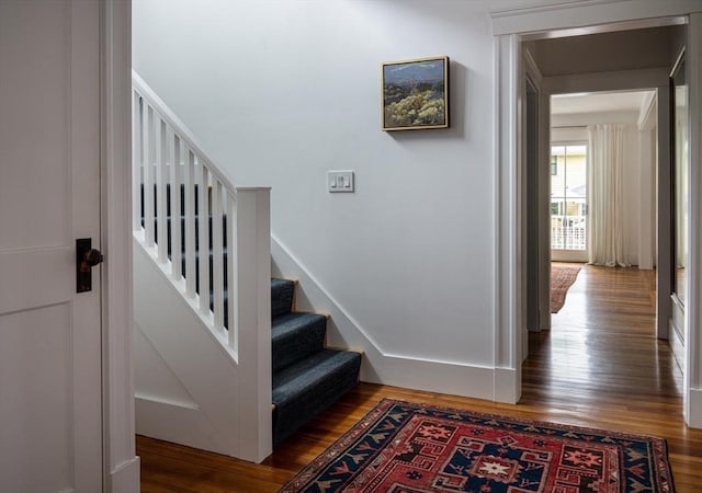 141 Fayerweather St, Cambridge, MA 02138 - staircase featuring wood finished floors