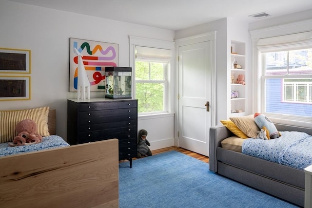 141 Fayerweather St, Cambridge, MA 02138 - bedroom featuring wood finished floors