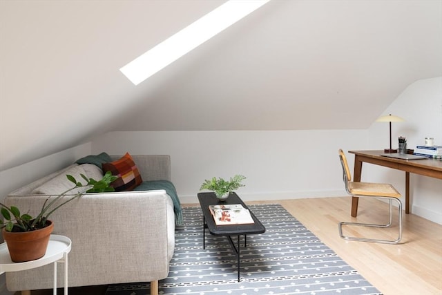 141 Fayerweather St, Cambridge, MA 02138 - office space with vaulted ceiling, wood finished floors, a skylight, and baseboards
