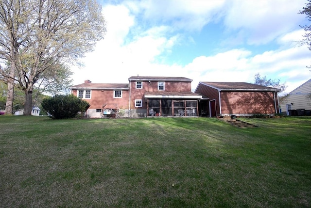 95 Bayberry Rd, Concord, MA 01742 - rear view of house featuring a sunroom, a lawn, and a chimney