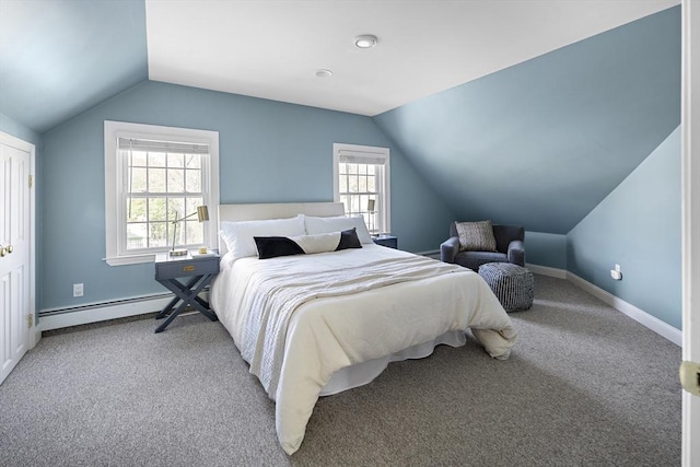 bedroom featuring light colored carpet, lofted ceiling, and baseboard heating
